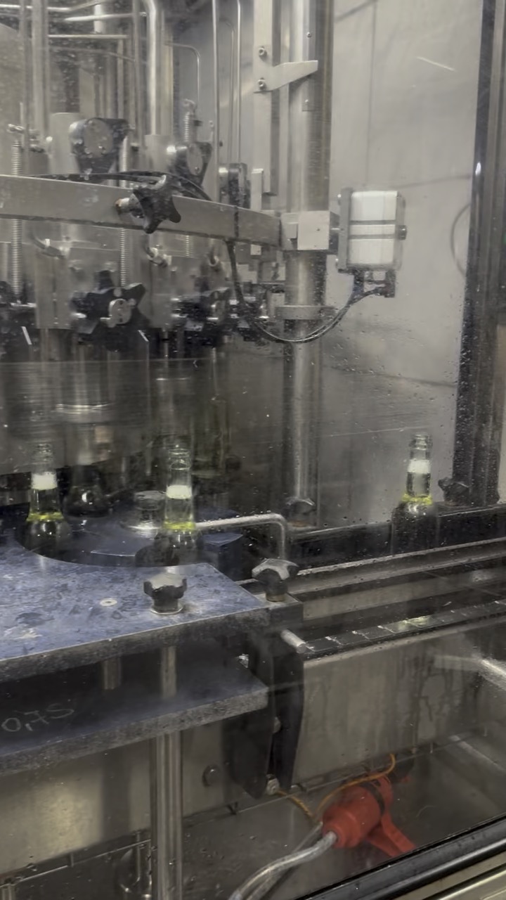 SANZANA bottles on the bottling line during filling